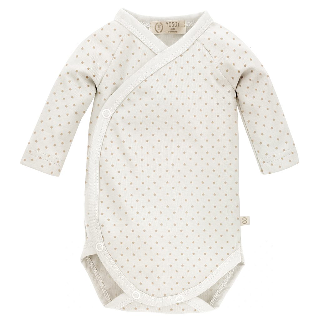 Body dziecięce z długim rękawem, w drobne kropki, w kolorze kremowym.