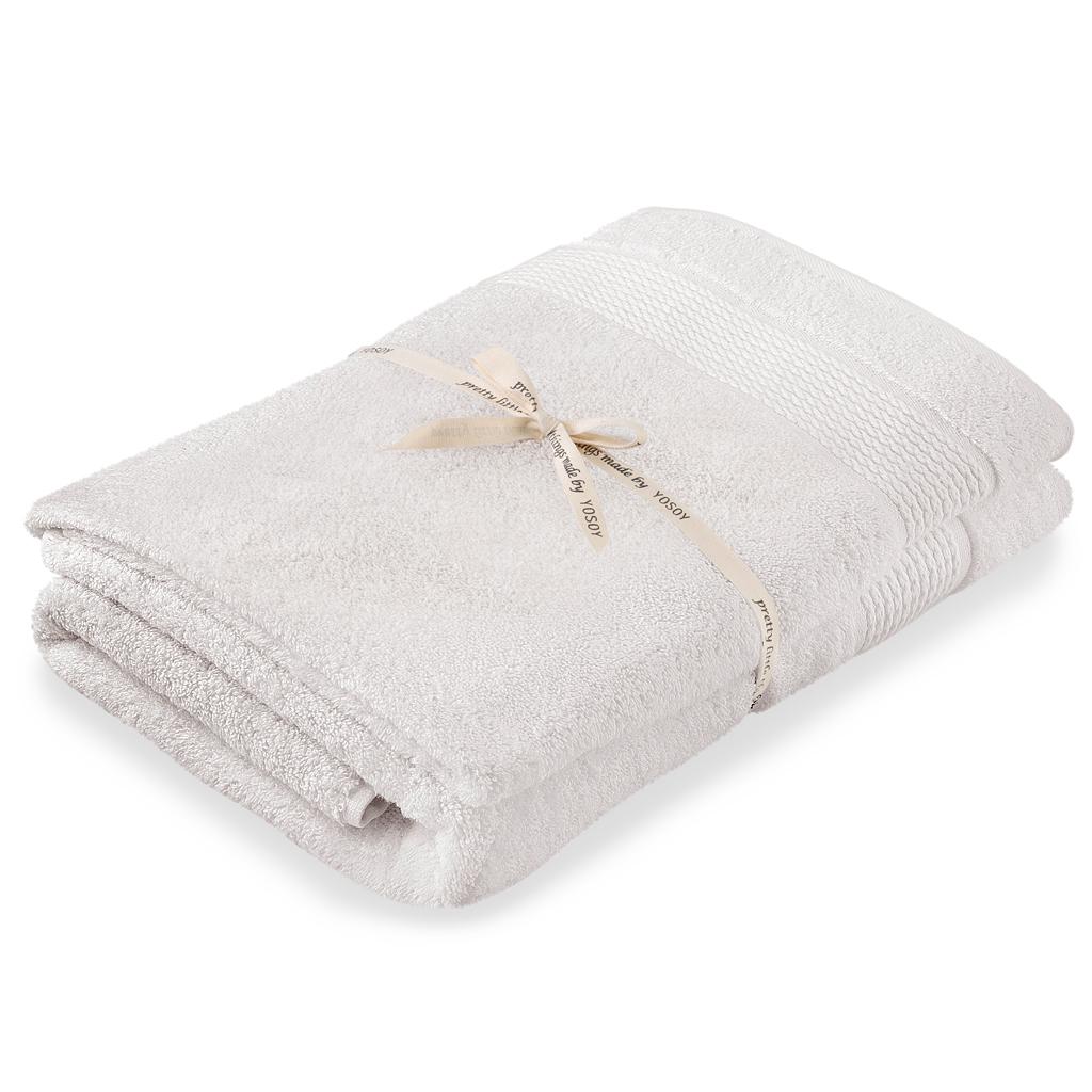 Komplet biały ręcznik dziecięcy z kokardą.