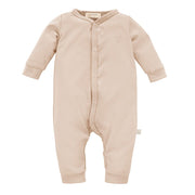 Rampers niemowlęcy bawełniany Basic YOSOY w kolorze beige zapięcie na napy naturalna bawełna premium