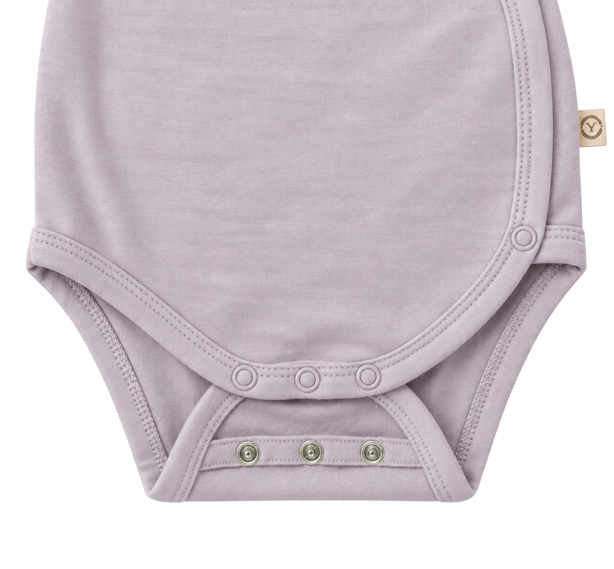 Zbliżenie na bezniklowe napy w body merino YOSOY w kolorze oatmeal.